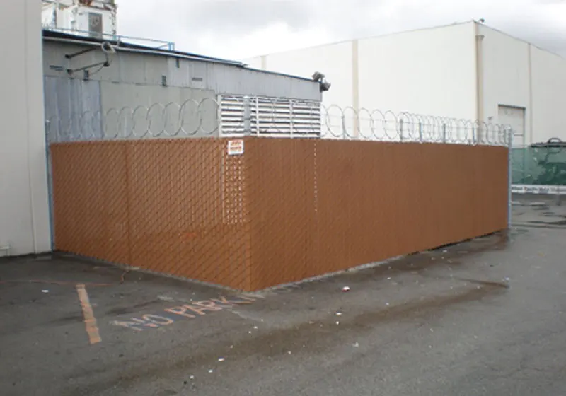 Brea Industrial - Chain-Link Slatted Fence With Razor Wire