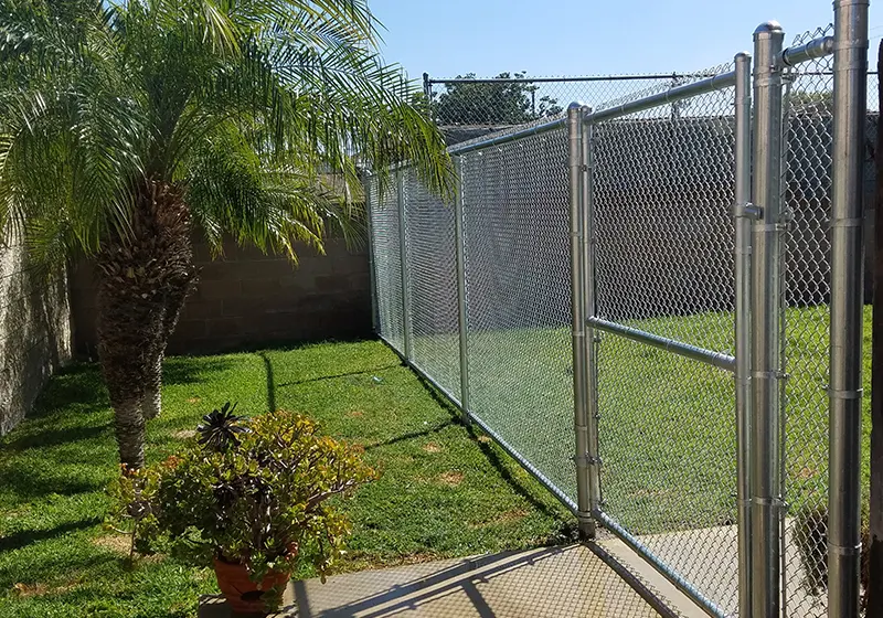 Chain link dog run in Garden Grove, CA